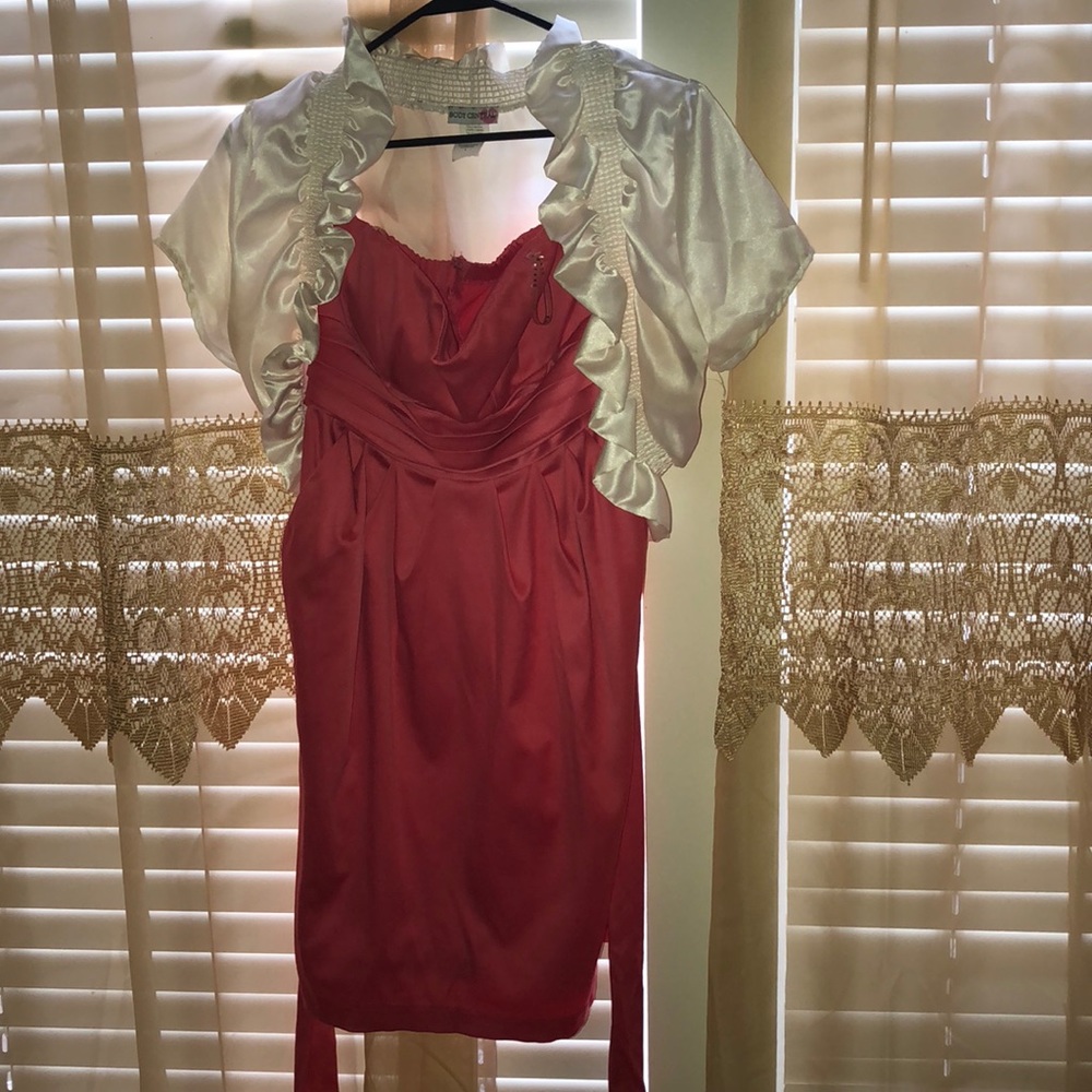 Guava strapless dress with a cream shrug.